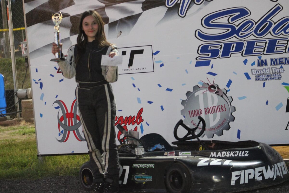 Madison in Winner's Circle at Emma Indoor Raceway
