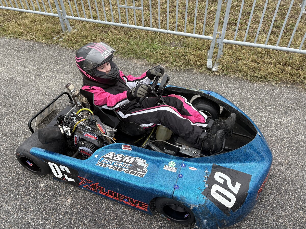 Madison working on kart 02 engine